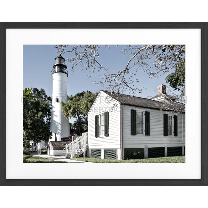 Weißer Leuchtturm mit angrenzendem Haus des Lichtwärters in Florida Key West