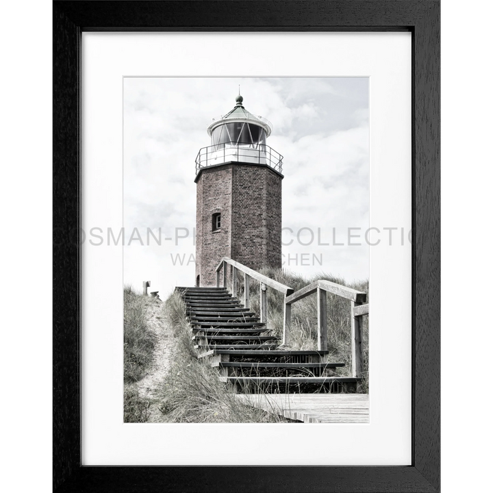 Stein Leuchtturm mit Holztreppe zum Eingang in Kampen, Sylt