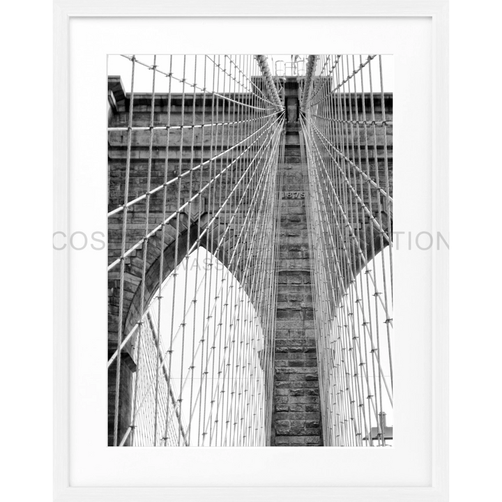 Gothic stone arch and suspension cables of Brooklyn Bridge in black and white poster