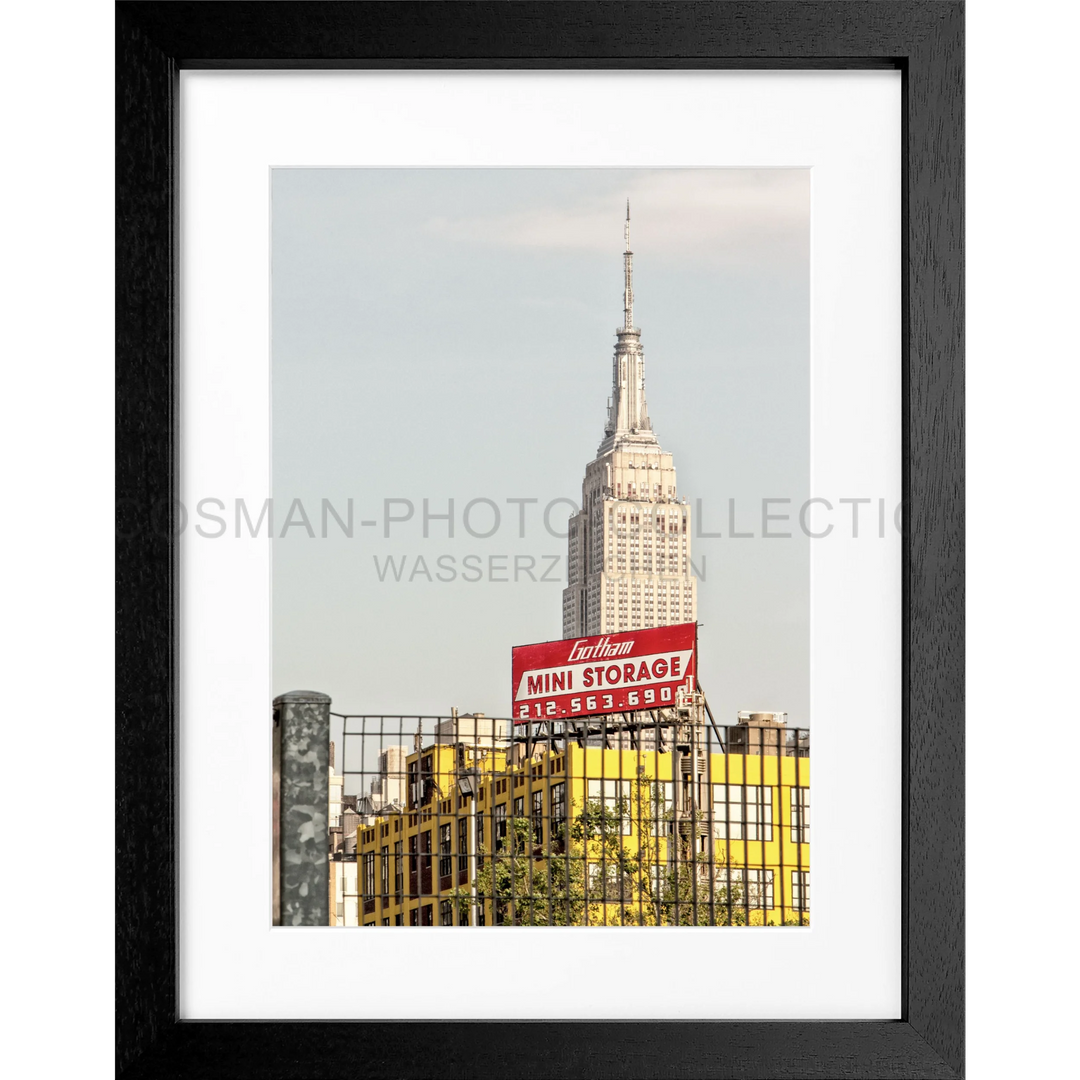 Empire State Building with spire above red billboard in NY117 poster