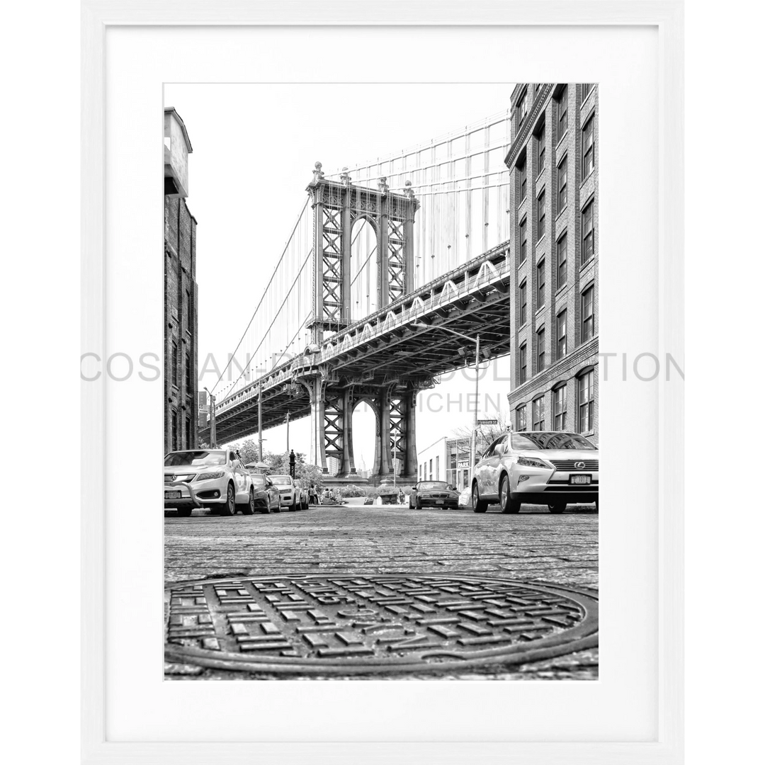 Manhattan Bridge in DUMBO, Brooklyn, captured from a charming cobblestone street