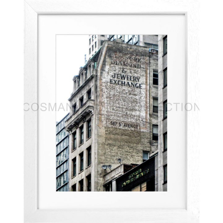 Verblasstes Vintage-Schild ’Jewelry Exchange’ auf Backsteinmauer in New York NY33A